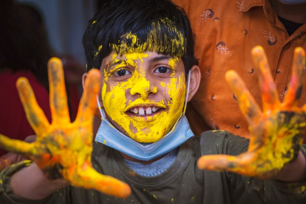 Children playing with paints