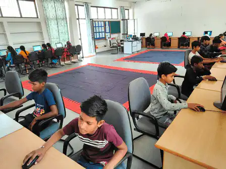 student in a computer lab during a class activity