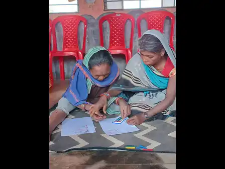 Parents-exploring-colors-for-the-first-time-in-Lattidera-Centre-during-Womens-Day