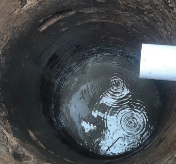 Rainwater being captured by the well